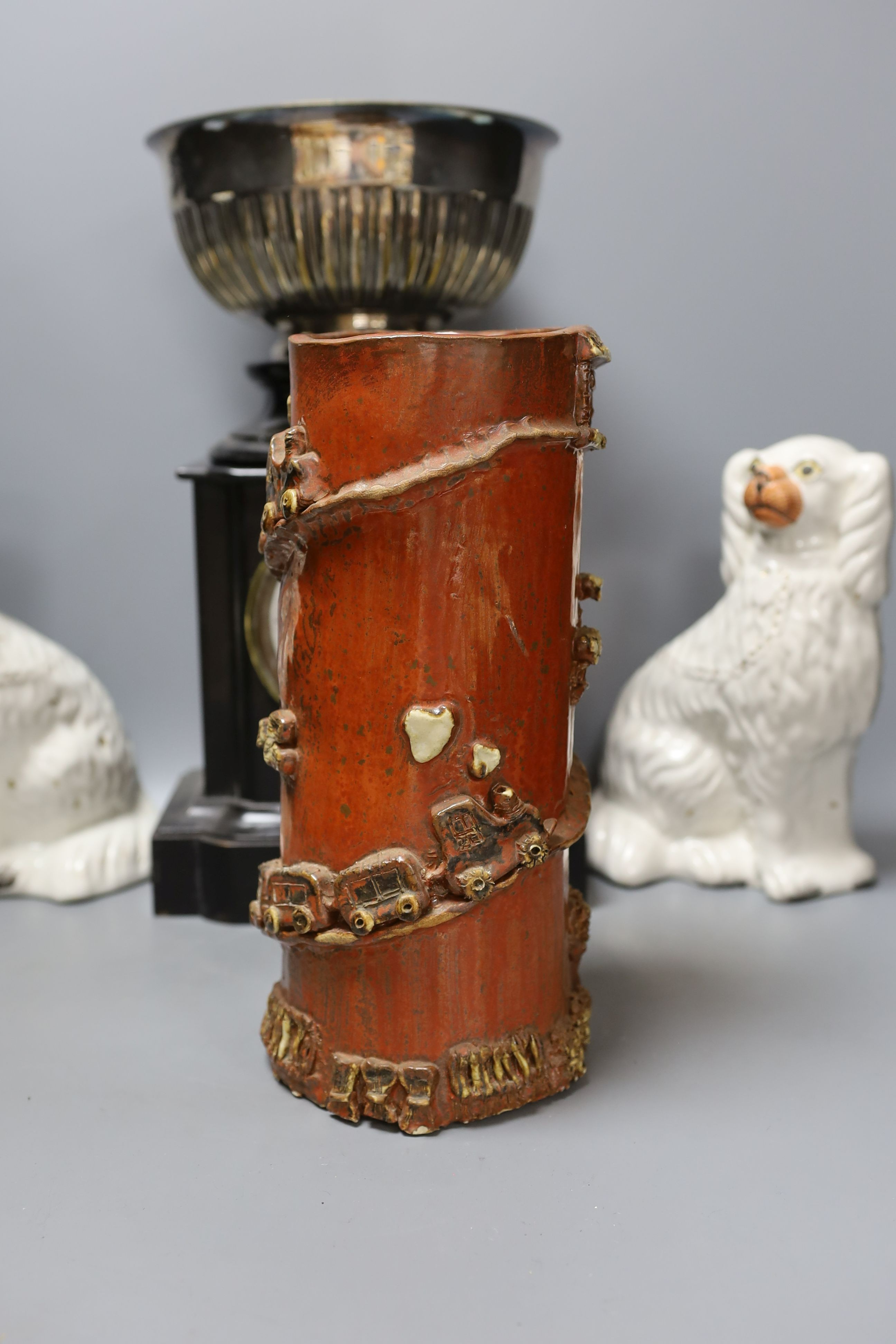 A pair of Staffordshire dogs, together with a pottery brush pot, Howell James mantle clock and other miscellaneous items including postal scales (7)